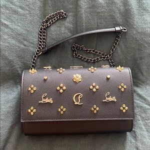 N/A Luxury Black Designer Bag with Gold and red Accents